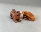 2 Hand carved Boxwood ojime of Japanese mythical animal, fu dog, temple lion, guardian, lizard