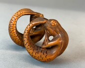 2 Hand carved Boxwood ojime of Japanese mythical animal, mermaid, sleeping mermaid