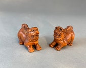 2 Hand carved Boxwood ojime of Japanese mythical animal, fu dog , temple lion, guardian