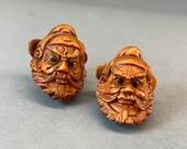 2 Hand carved Boxwood ojime of Chung Kwei, a deity who is a vanquisher of ghosts and evil beings, signed by artist