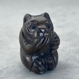 One Teakwood Ojime: panda, ironwood panda bead, wood panda charm, dark wood seated panda toggle, hand carved and signed by the carver