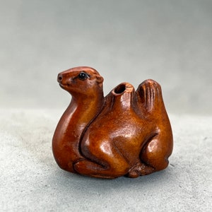 One wood carving of a miniature camel, wood standing camel bead, boxwood standing camel ojime, miniature camel carving, collectible
