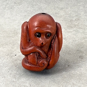One Hand carved boxwood ojime: octopus, wood octopus bead, wood octopus charm, octopus toggle, kimono accessory, earrings, signed by artist
