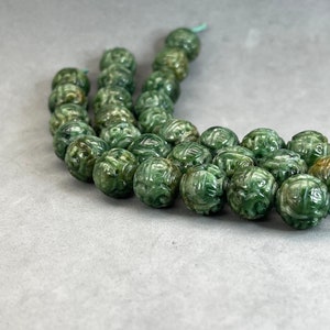One Jade carving:1 hand carved natural color jadeite bead, carved with dragon and longevity symbols, jade dragon bead, natural color fei cui