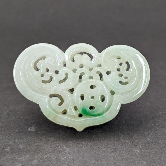 Hand carved jade charm: flowers, a symbol of tran… - image 1