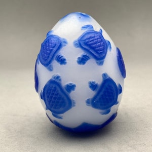 Vintage Peking glass egg of overlay blue monochrome turtle design, blue turtle on white ground Peking glass ornament, longevity symbol