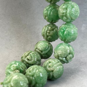 Jade carving: 1 hand carved natural color jadeite bead, carved with dragon and longevity symbols, jade dragon bead, natural color fei cui