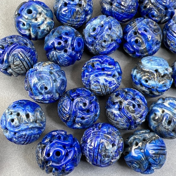 Carved stone beads best sale