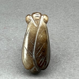 Jade carving: One hand carved burnt jade bead of a cicada, soft jade carving of a cicadal, symbol of prosperity and wealth, vintage nephrite