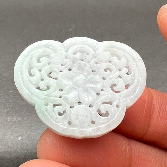Hand carved jade charm: flowers, a symbol of tran… - image 1