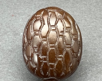 Jade carving: One hand carved burnt jade bead of a turtle, soft jade carving of a turtle shell, symbol of longevity and prosperity, vintage