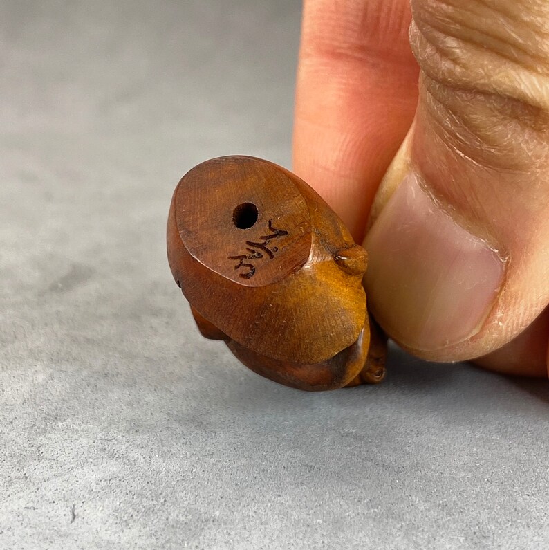 wood monkey bead symbol of prosperity and wisdom year of the monkey One hand carved boxwood ojime: Monkey signed by the artist