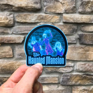 The Haunted Mansion Hitchhiking Ghosts Sticker & Magnet