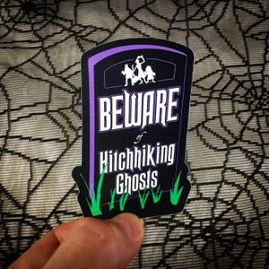 Beware of Hitchhiking Ghosts Sticker & Magnet