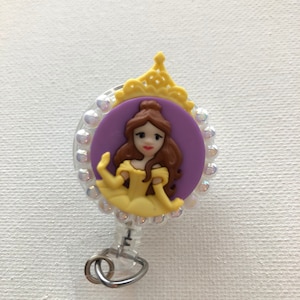 Carrete Belle Badge de Disney