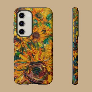 May include: A phone case featuring a colourful sunflower design. The case is made from hard plastic and has a raised edge to protect the screen.