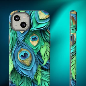 May include: A phone case with a peacock feather design. The case is made of a hard plastic material and has a raised edge to protect the screen. The design features a variety of blue, green, and gold colors.