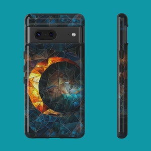 May include: A black phone case with a mosaic design featuring a crescent moon in shades of orange, yellow, and blue.