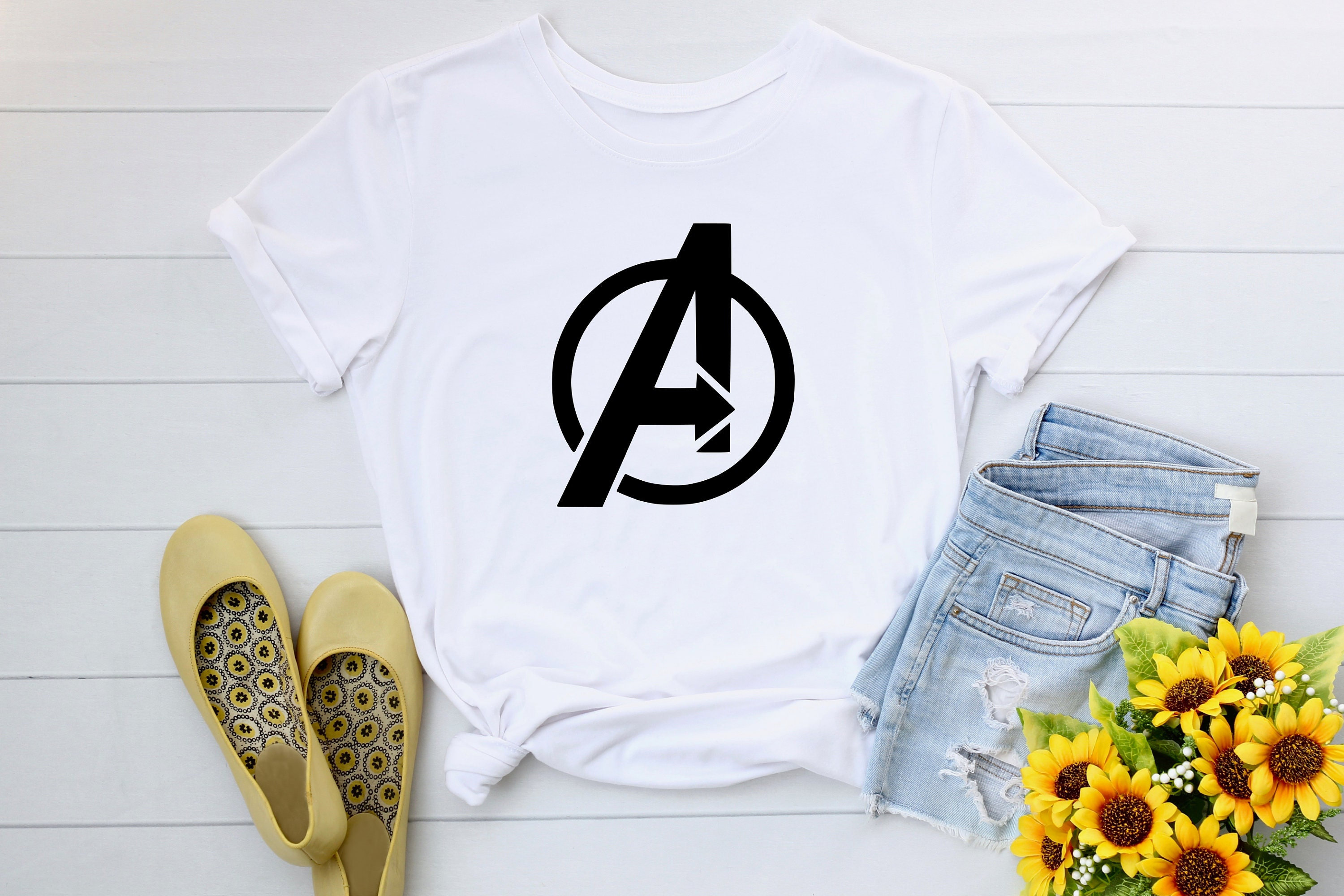 Avengers symbols shirt sales
