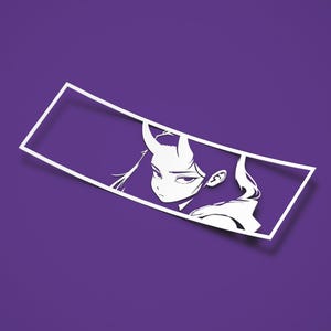 May include: A white rectangular vinyl decal featuring a stylized graphic illustration of a character with a single horn on their forehead. The design is cut out from the white material, showcasing the character's face and hair in a sharp, clean aesthetic.
