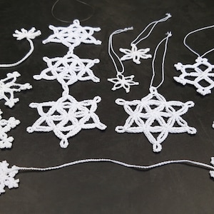 12 Tutorials crochet Snowflakes