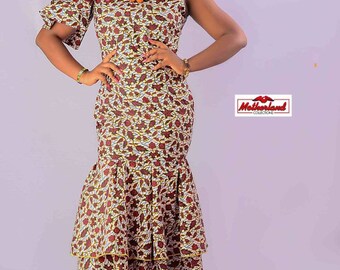 Ankara dress with unique style for modern classy lady. Well tailored and made with quality Ankara fabric.