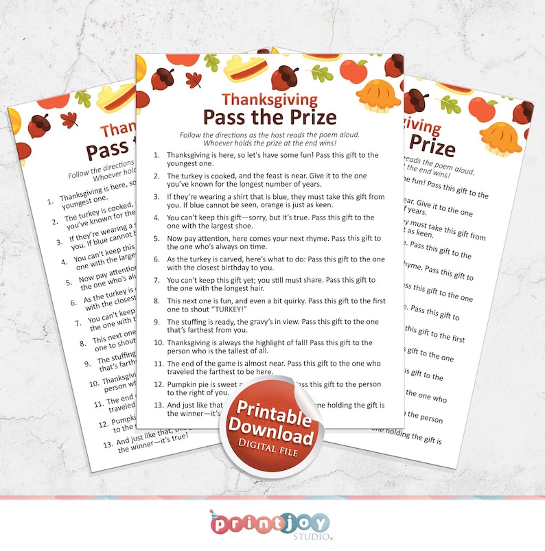 May include: Printable Thanksgiving game card with a festive autumn theme. The card features a poem with instructions for a "Pass the Prize" game, where players pass a gift around based on the poem's clues. The card is decorated with pumpkins, acorns, and leaves.