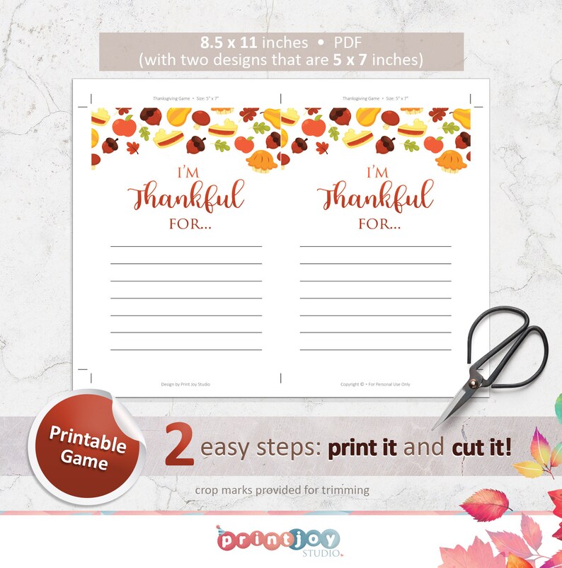 May include: Printable Thanksgiving game with two designs. Each design features a fall-themed border with pumpkins, leaves, and acorns. The text "I'm Thankful For..." is printed in brown on a white background. The game is 8.5 inches by 11 inches and can be cut into two 5 inches by 7 inches cards.