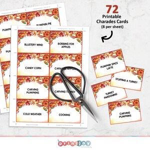 May include: A set of 72 printable charades cards on sheets with autumn-themed borders featuring pumpkins, leaves, and corn. The cards include text such as Blustery Wind, Bobbing for Apples, and Turkey Pardoning. A pair of black metal scissors rests on top.