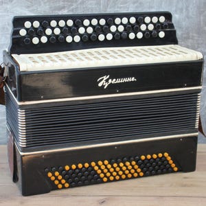 Accordion instrument, Bayan Creminne, harmonic,antique green button accordion, retro vintage musical instrument, black Bayan made USSR.