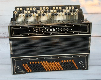 Accordion instrument, Bayan,harmonic,antique black chromatic button  accordion, soviet retro vintage musical instrument, Bayan made USSR.