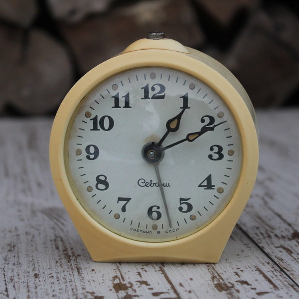 Vintage alarm clock Sevani, Russian table clock, soviet souvenir gift, retro desk clock made in the USSR in the 1970s.