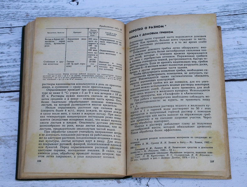 May include: Open book with a white background. The left page has a table with text and numbers. The right page has text about how to deal with household fungus. The text on the right page reads "SHORTLY ABOUT DIFFERENT THINGS. FIGHTING HOUSEHOLD FUNGUS."