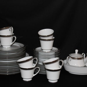 Beautiful Noritake Crestwood Platinum set for 8 persons plus extras