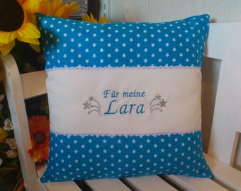 Pillow with desired name (turquoise stars)