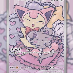 May include: A trading card featuring Skitty and Espurr with 70 HP. The illustration shows the two characters sleeping on a pink heart-shaped pillow. Text includes Skitty & Espurr, Nap, Heal 20HP damage from all your benched Pokémon, and They outsmart opponents with speed, teamwork, and a little mischief. Cute together. Strong together.