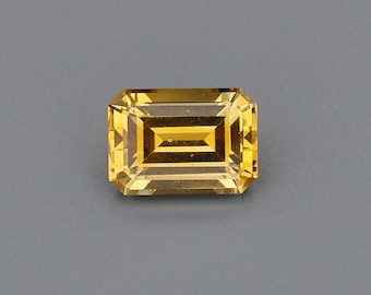 1,25 ct Natuurlijke hittebehandelde saffier geel-oranje / gele smaragd 6,99 x 4,98 mm