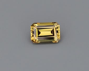 0,88 ct Natuurlijke hittebehandelde saffier geel-oranje smaragd 6,49 x 4,49 mm