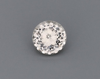 Natuurlijke, onverhitte saffier van 1,01 ct, geel/wit, rond, 6,00 x 6,00 mm