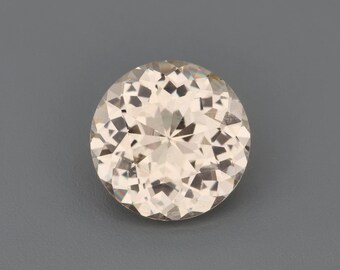 1.37ct Natural Unheated Sapphire Pink-Orange Round 6.83x6.82mm