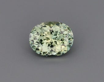 2.17ct Natural Heat Only Sapphire Yellow-Green / Multi-Color / Blue-Green Oval 8.51x6.73mm
