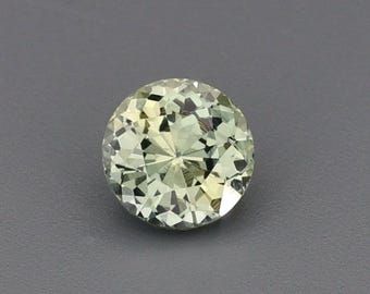 0.6ct Natural Unheated Sapphire Yellow / Blue-Green Round 4.99x4.99mm