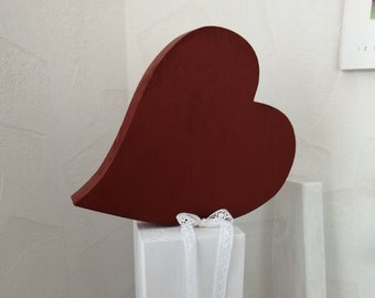 Decorative heart - wooden heart on a beam