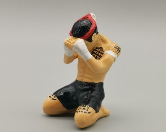 Red Muay Thai Statue