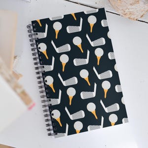 Golfing Pattern (Black/Orange) Spiral notebook