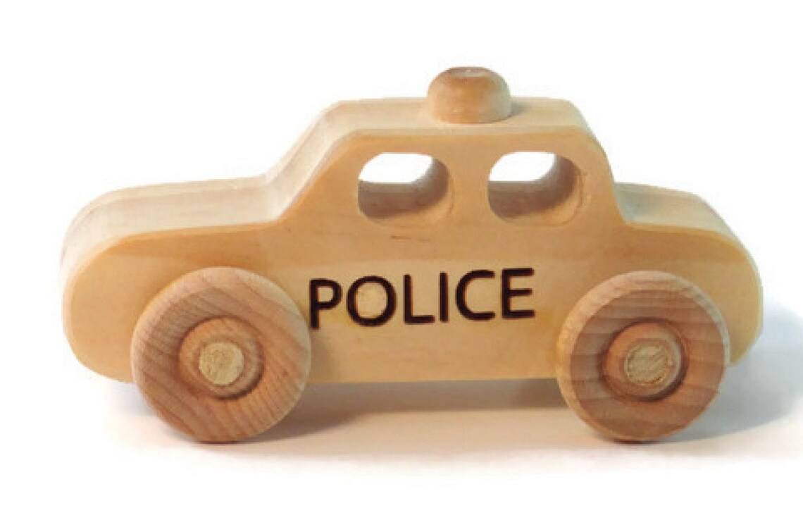 toy police car with policeman