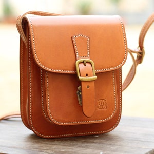 Stylish Mini Crossbody Bag in Genuine Leather with Buckle Detail image 1