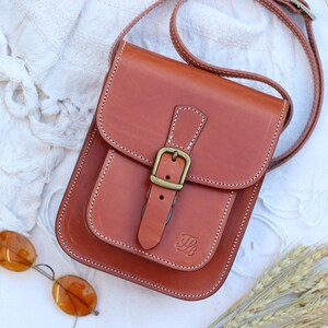 Stylish Mini Crossbody Bag in Genuine Leather with Buckle Detail Light brown