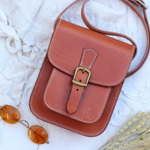 Small cowhide leather handbag with adjustable strap and lock for men or women, Leather crossbody bag for women Camel Brown