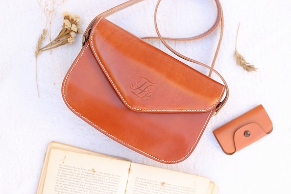 Buy the Dooney and Bourke Women's Red and Tan Leather Mini Purse |  GoodwillFinds